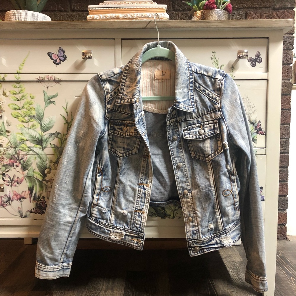Lost distressed woman’s denim jacket